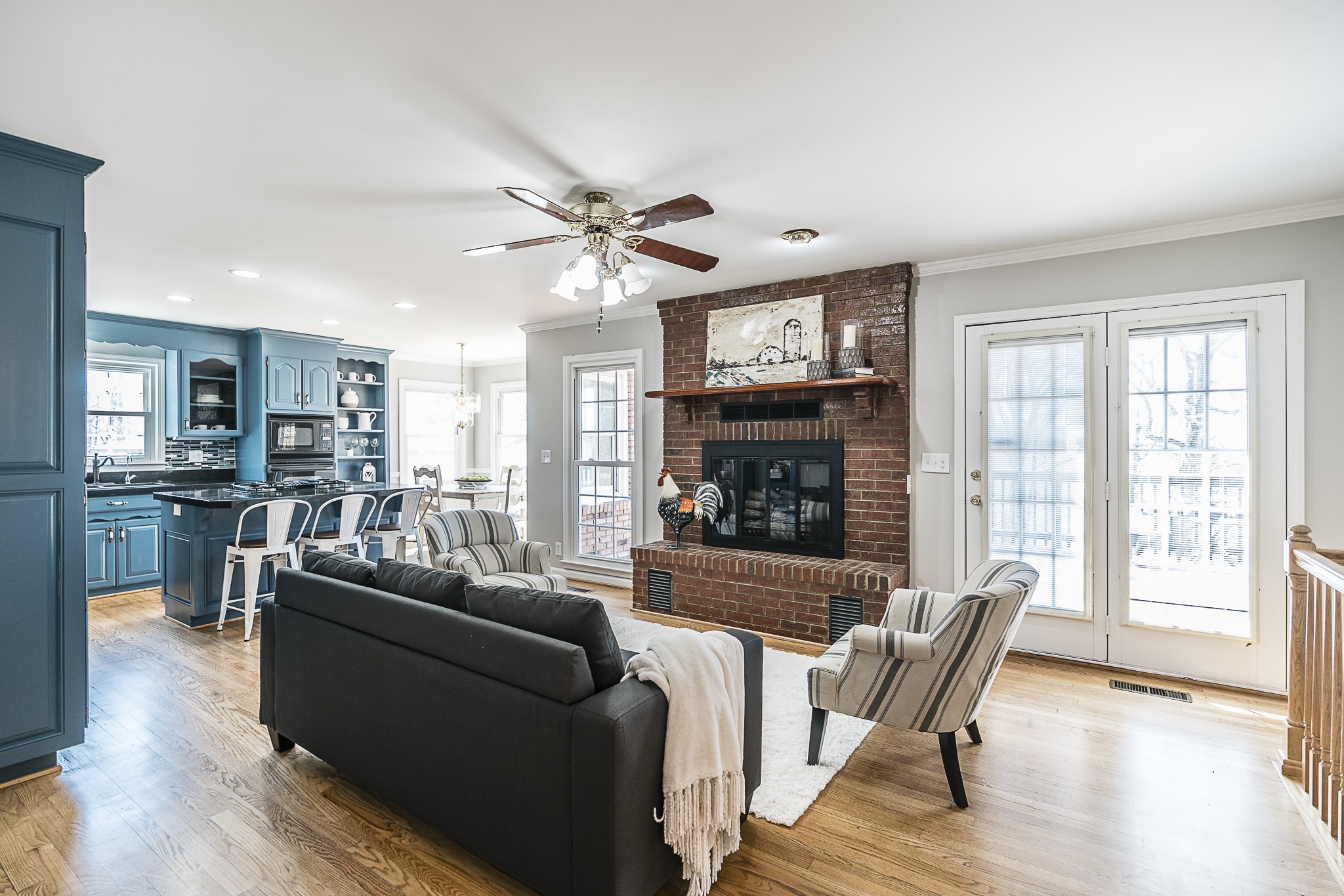 1626 Valley View Road Goodlettsville, TN 37072 - Photo 12 of 70 a living room with furniture a wooden floor and a fireplace