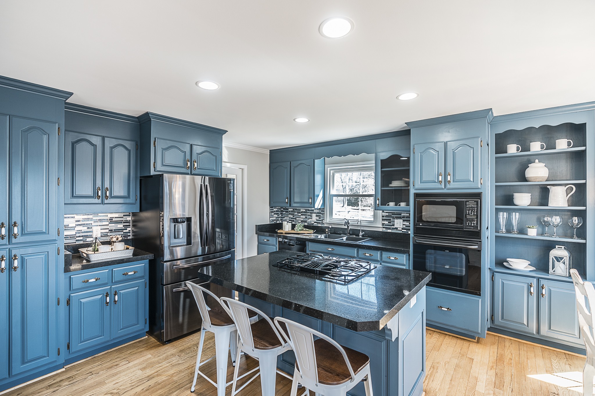 1626 Valley View Road Goodlettsville, TN 37072 - Photo 18 of 70 a kitchen with wooden cabinets and stainless steel appliances