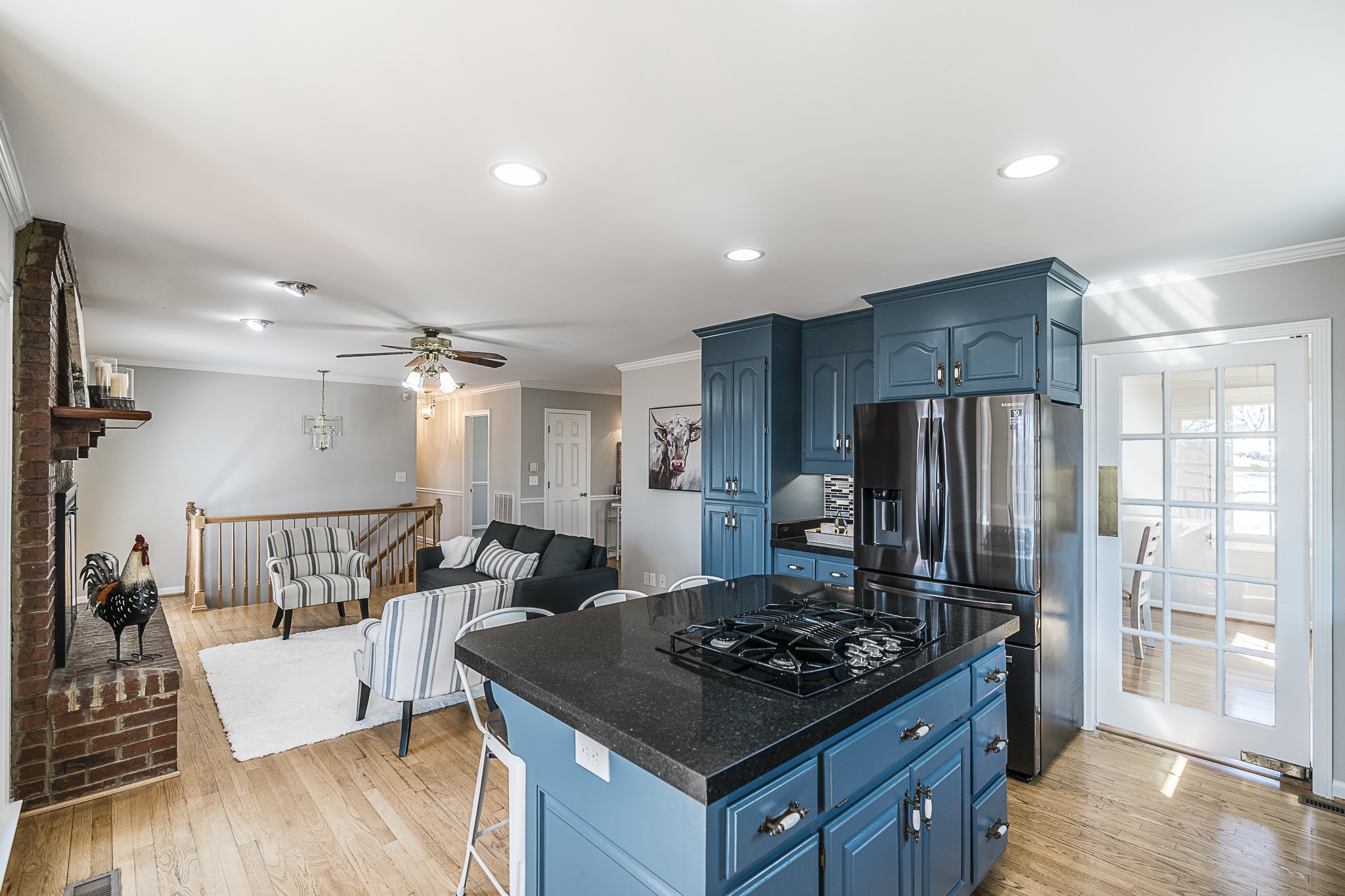1626 Valley View Road Goodlettsville, TN 37072 - Photo 22 of 70 a kitchen with stainless steel appliances granite countertop a stove refrigerator and wooden floor
