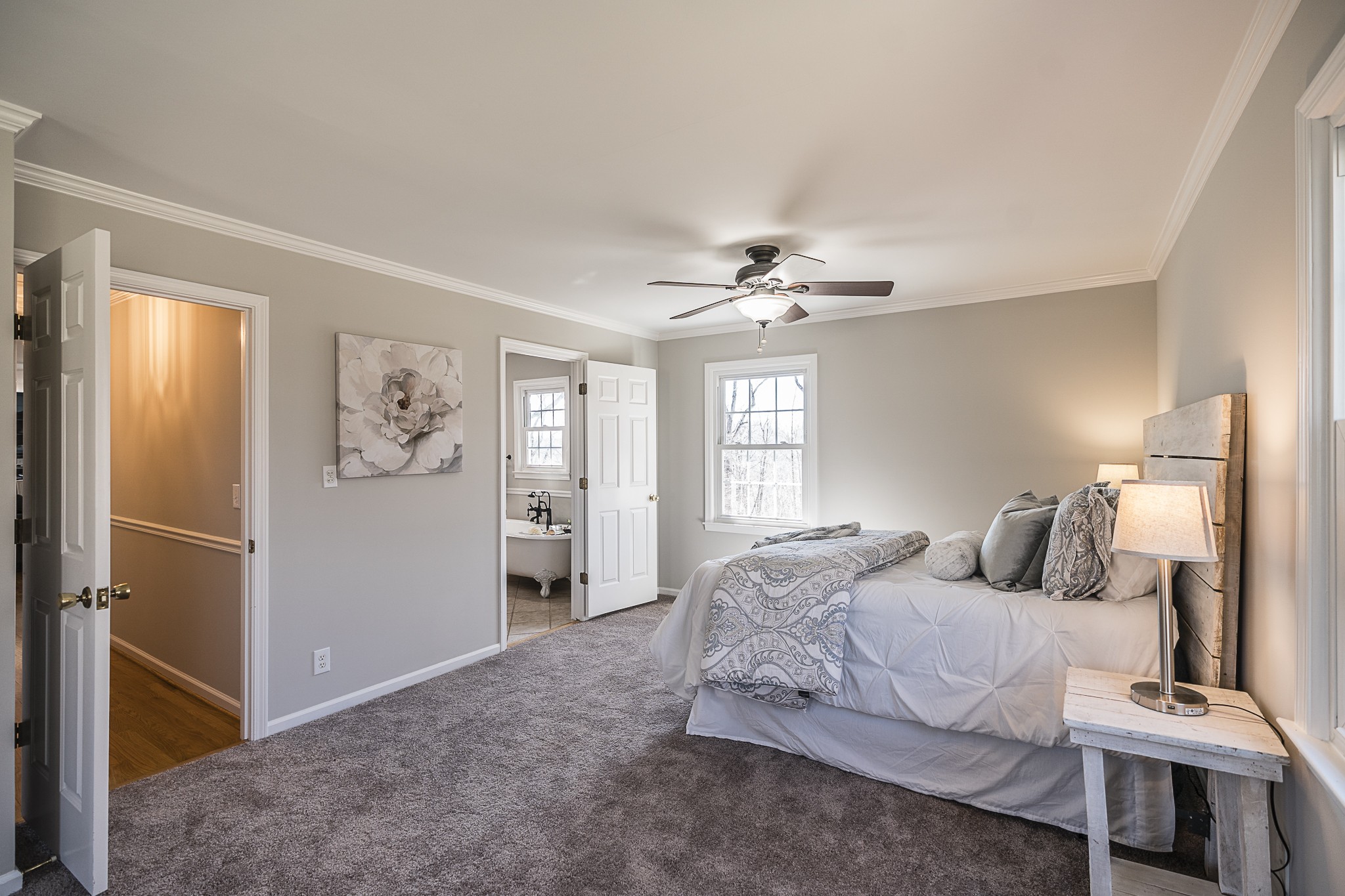 1626 Valley View Road Goodlettsville, TN 37072 - Photo 27 of 70 a bedroom with a bed and a chandelier