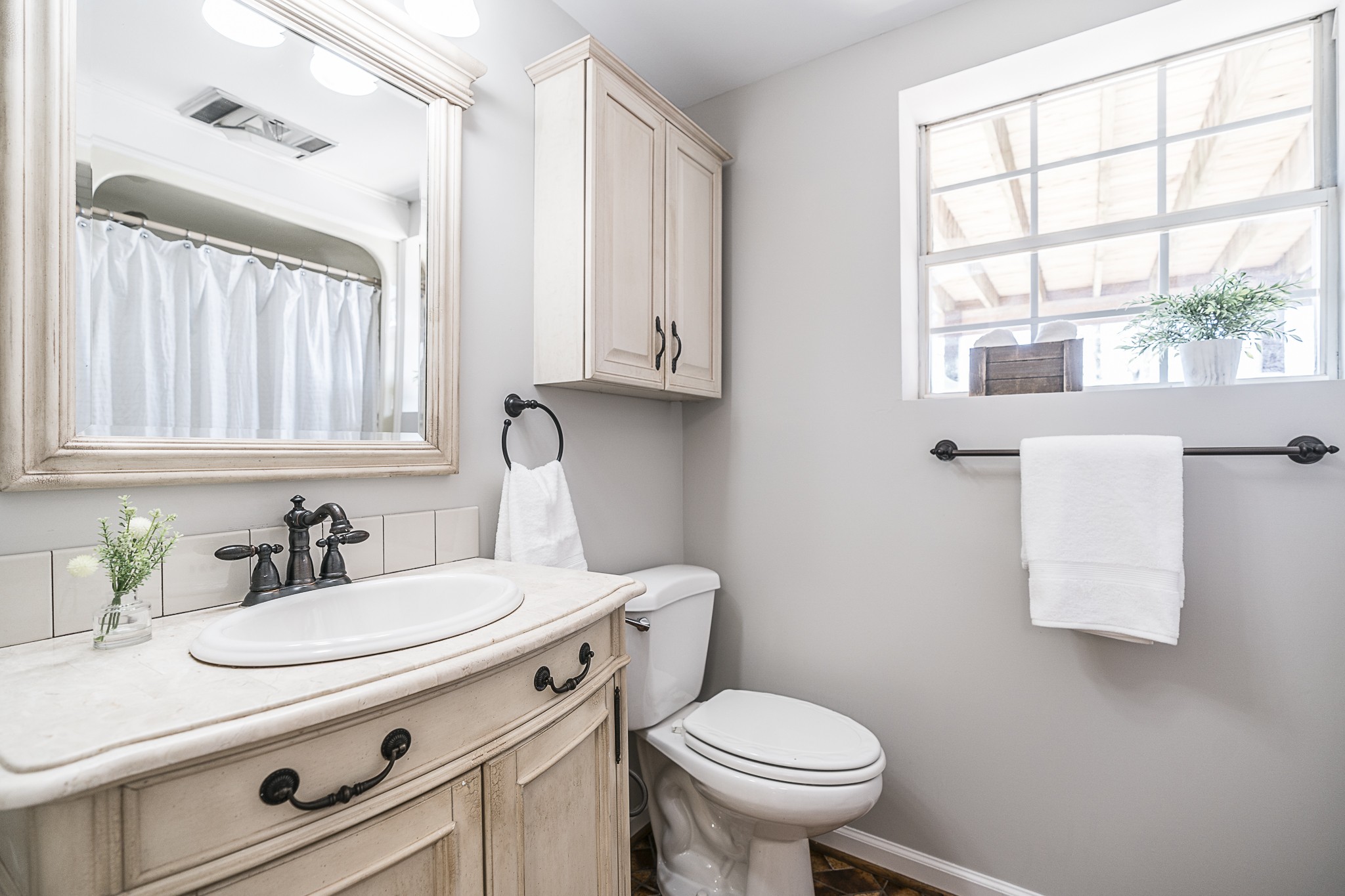 1626 Valley View Road Goodlettsville, TN 37072 - Photo 46 of 70 a bathroom with a sink toilet and window