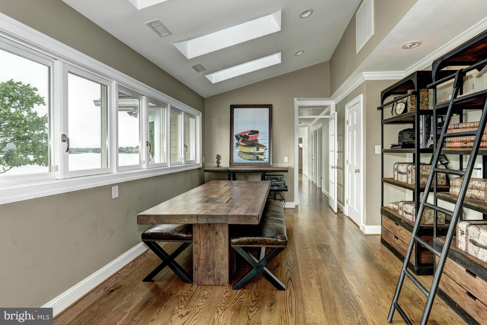 532 Sunset Road Annapolis, MD 21403 - Photo 11 of 30 a dining room with furniture and wooden floor