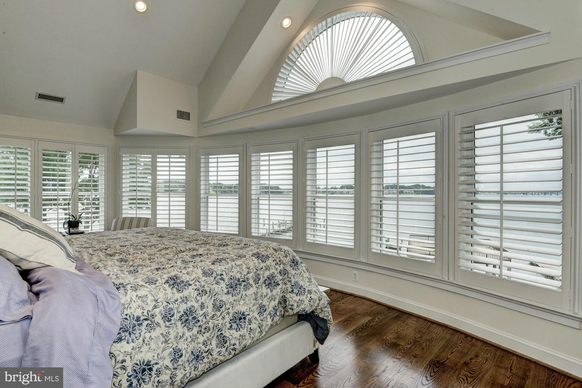 532 Sunset Road Annapolis, MD 21403 - Photo 12 of 30 a bedroom with a large bed and a large window