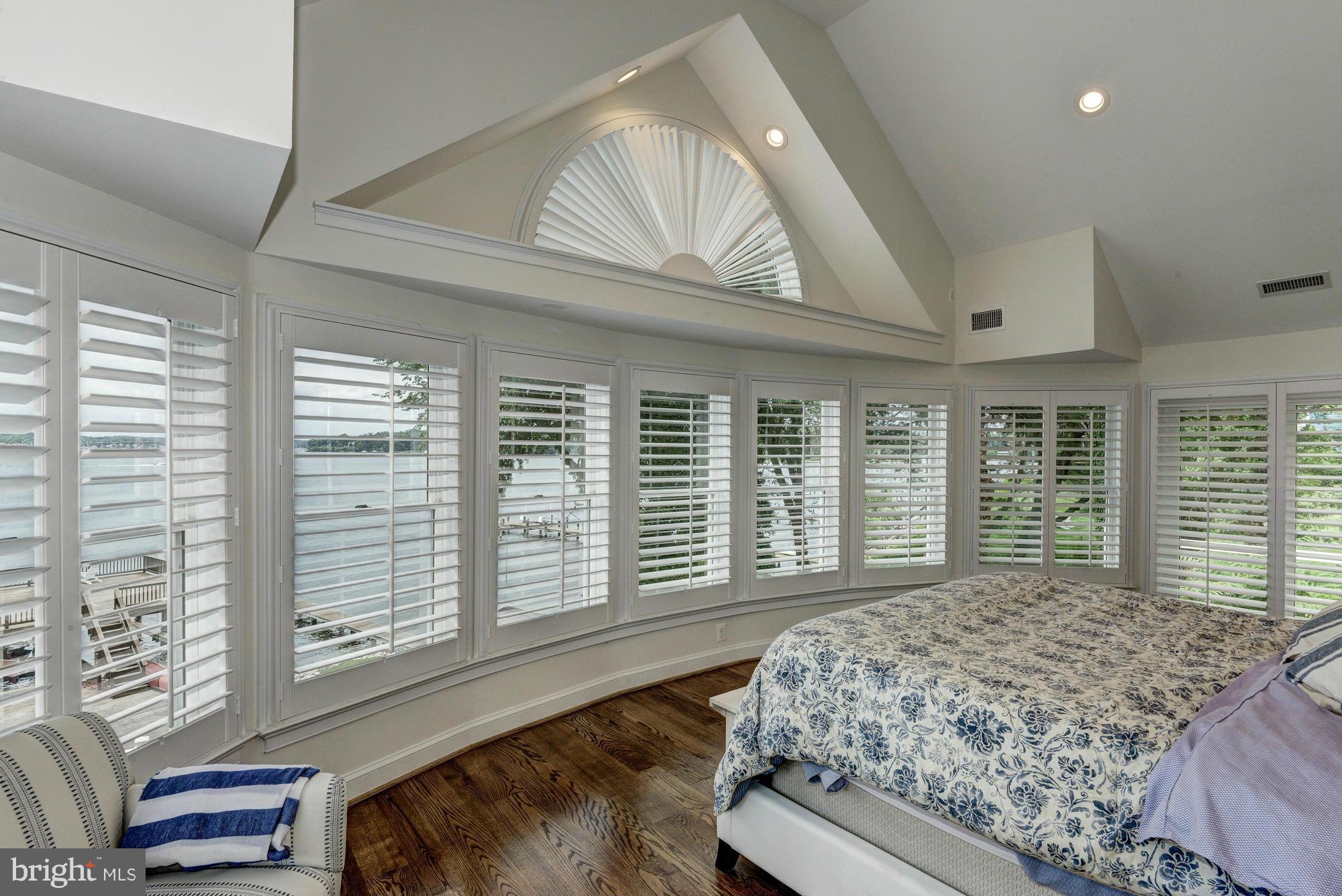 532 Sunset Road Annapolis, MD 21403 - Photo 13 of 30 a bedroom with a large bed and a large window