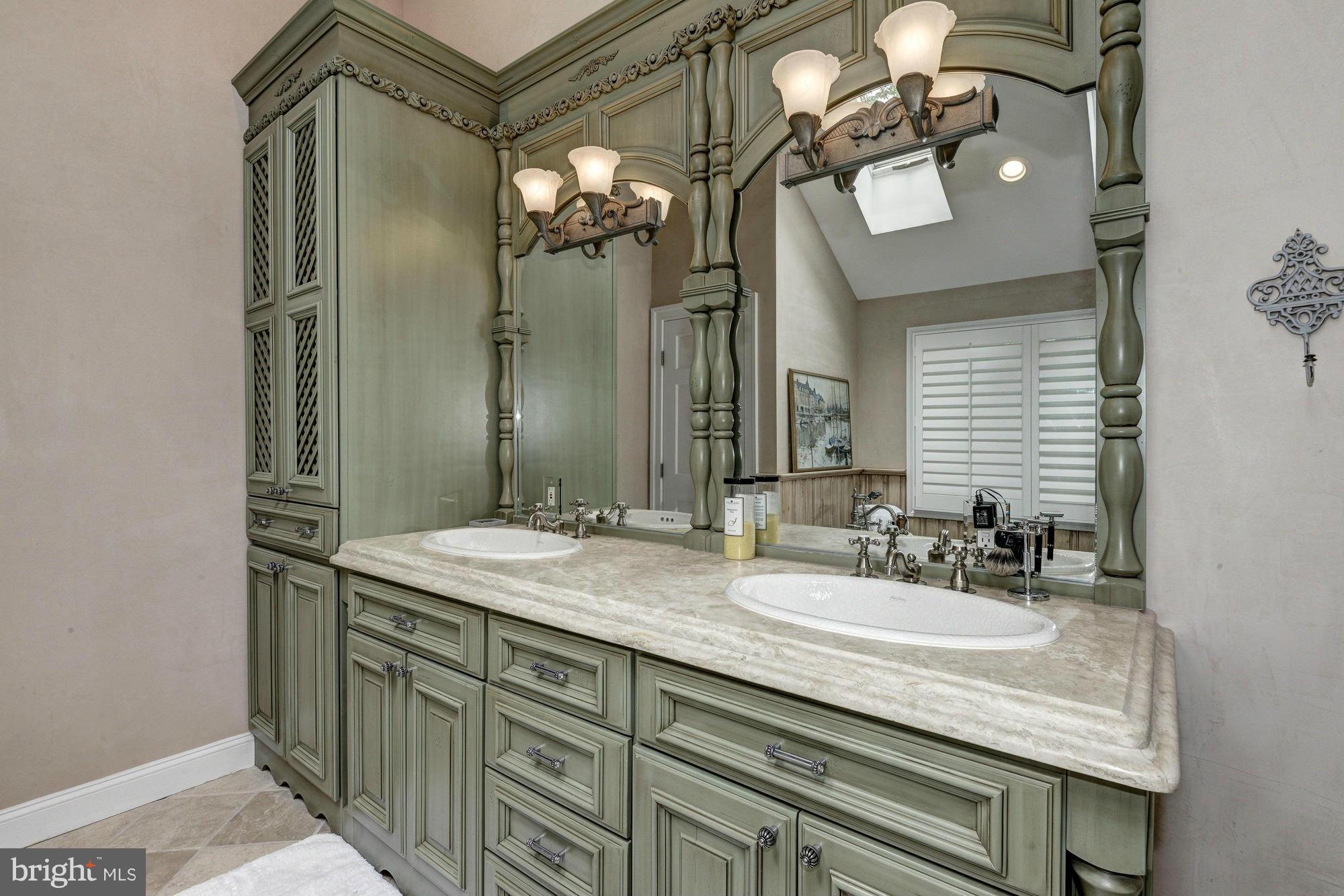 532 Sunset Road Annapolis, MD 21403 - Photo 14 of 30 a bathroom with a granite countertop sink and a mirror