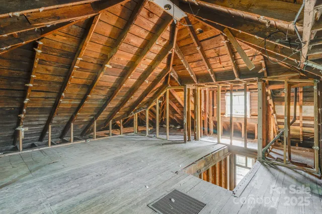 a view of a room with wooden deck