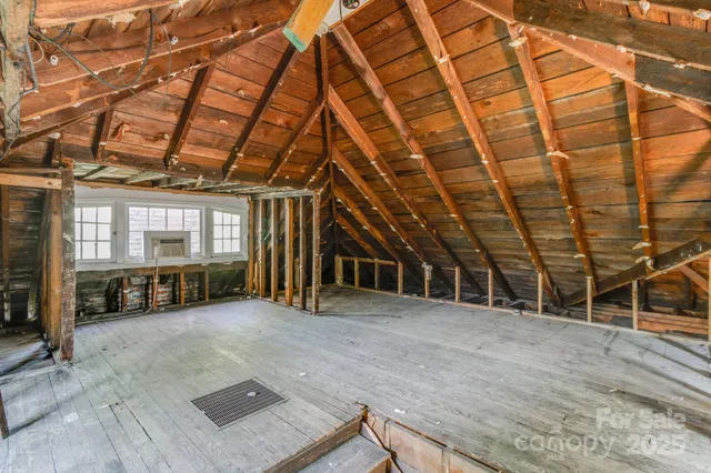 a view of a garage with wooden wall