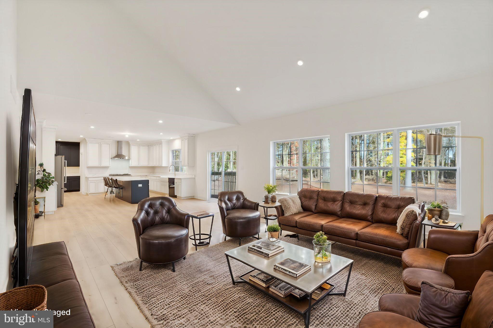 35 Barbertown Point Breeze Road Frenchtown, NJ 08825 - Photo 16 of 43 a living room with furniture fireplace and a large window