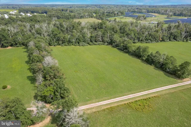 a view of a lake with a yard