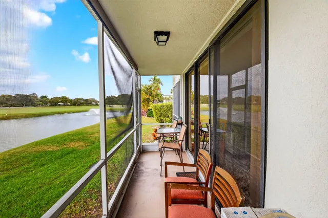 a view of a garden with swimming pool
