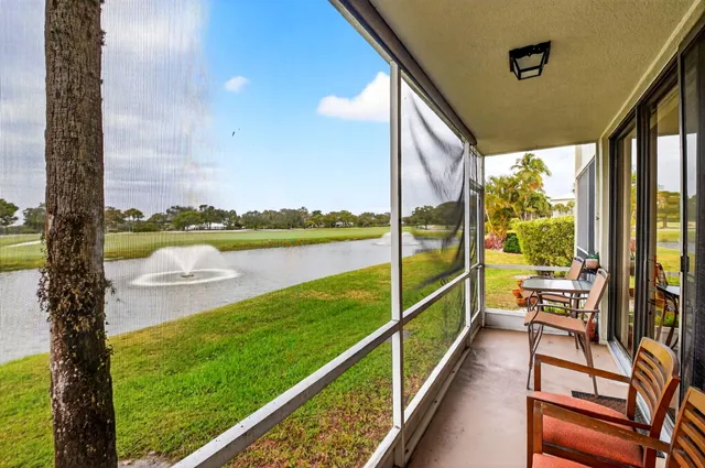 a view of a lake with a big yard