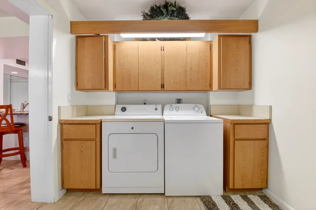 an aerial view of a house with a swimming pool yard and outdoor seating