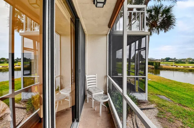 an aerial view of a house with outdoor space