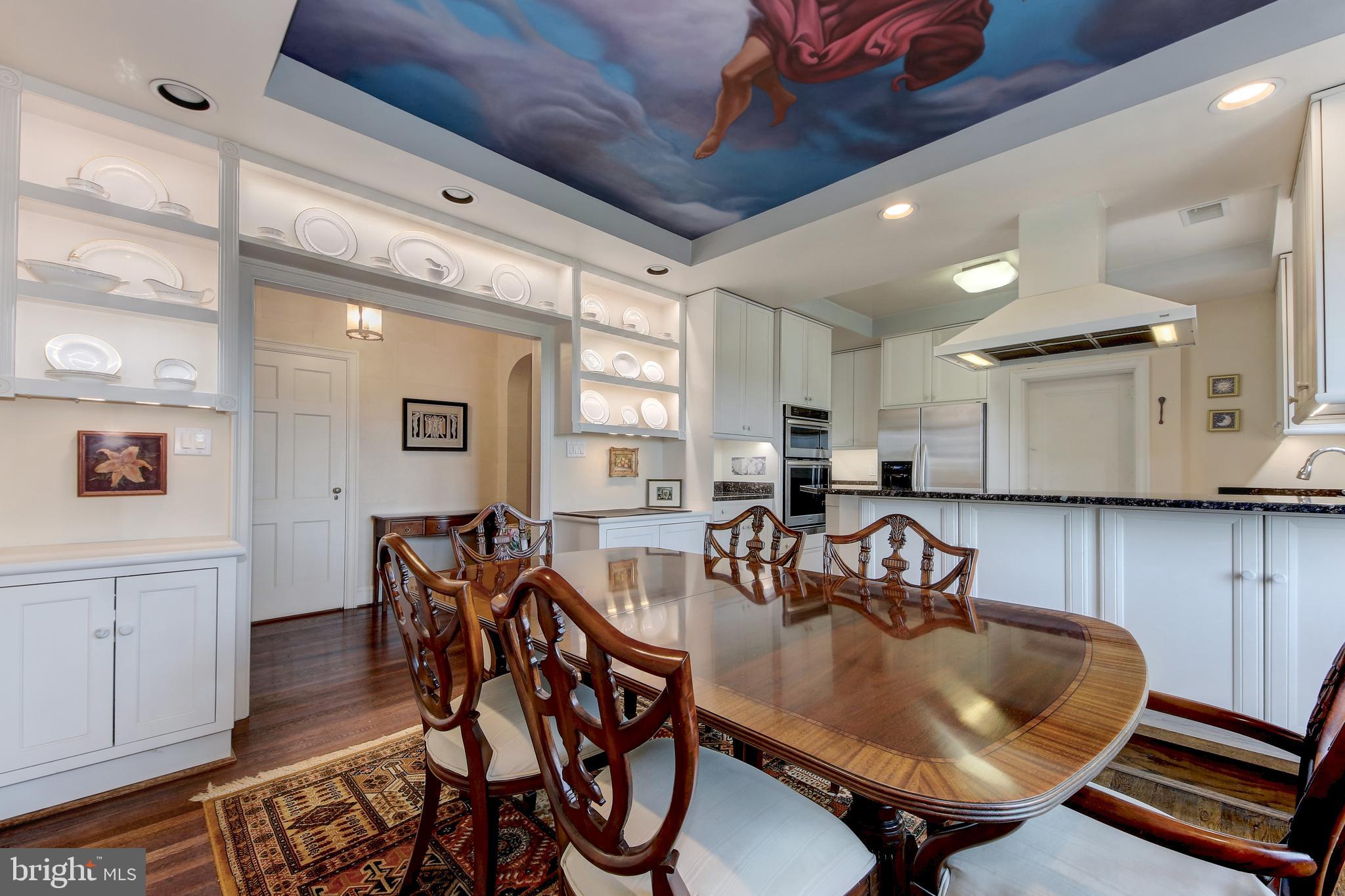 3000 Tilden Street Northwest, Unit 503I Washington, DC 20008 - Photo 11 of 60 Wall of custom, lighted shelving for display