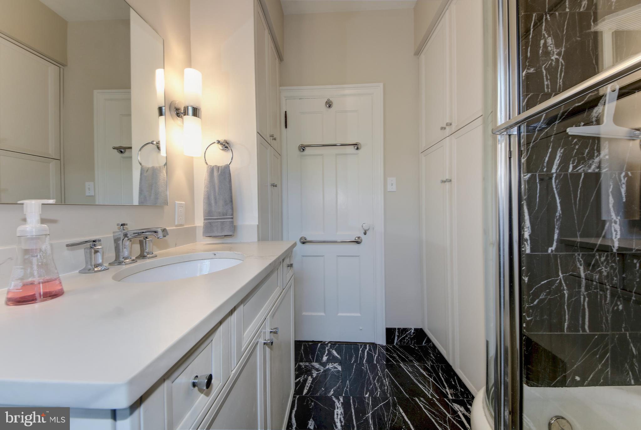 3000 Tilden Street Northwest, Unit 503I Washington, DC 20008 - Photo 25 of 60 Renovated hall bathroom