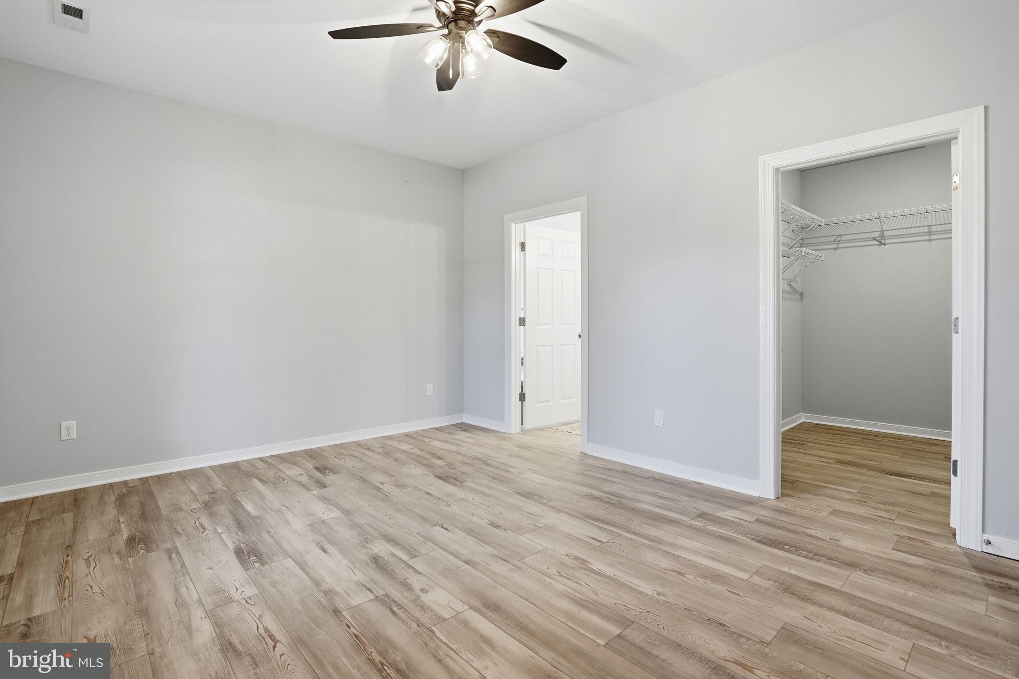 475 Fredericks Hall Road Bumpass, VA 23024 - Photo 20 of 44 wooden floor in an empty room