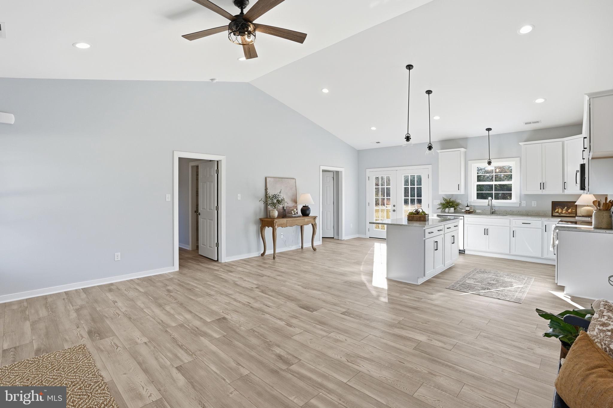 475 Fredericks Hall Road Bumpass, VA 23024 - Photo 7 of 44 a view of kitchen with cabinets and wooden floor