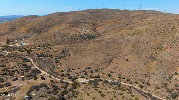 a view of mountains and valleys