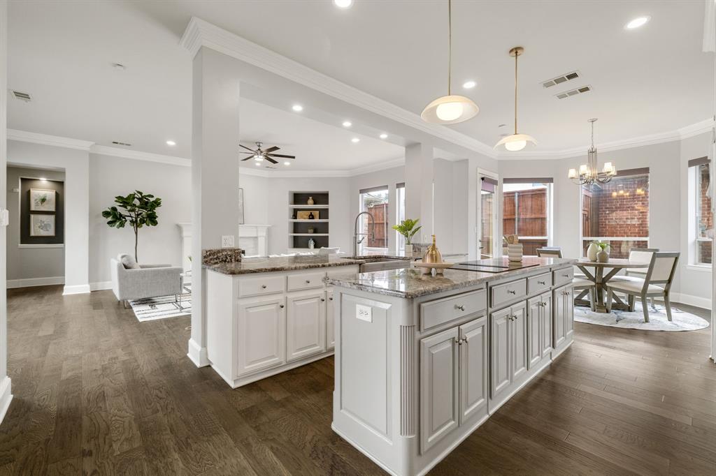 4512 Banyon Lane Dallas, TX 75287 - Photo 14 of 40 4512 Banyan Ln-Open spacious kitchen with double islands by Fang Underhill.