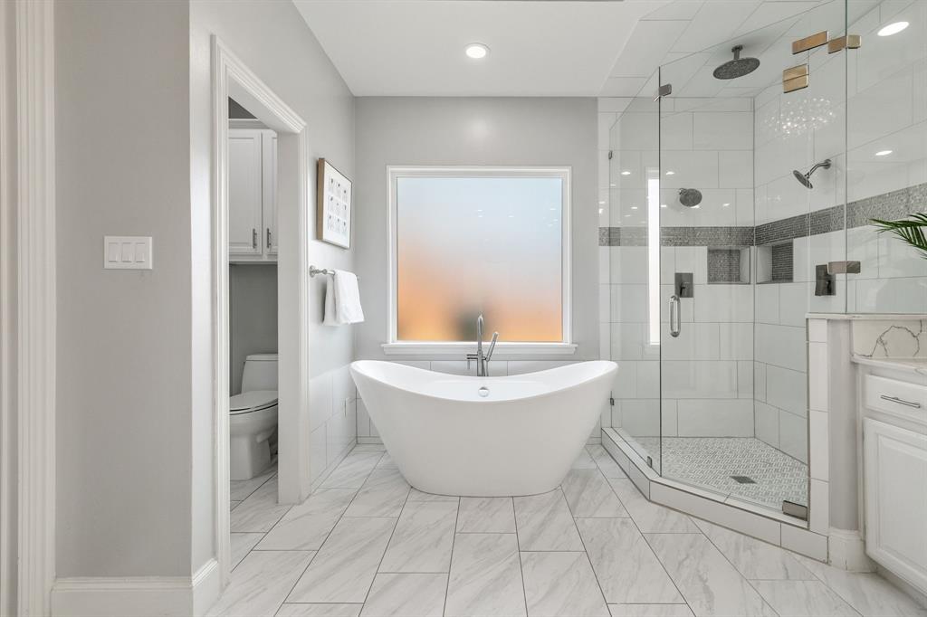 4512 Banyon Lane Dallas, TX 75287 - Photo 26 of 40 4512 Banyan Ln-Free standing soaker tub, double headed shower by Fang Underhill.