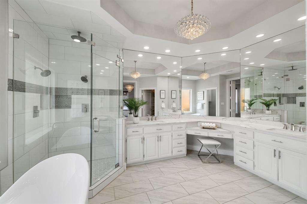 4512 Banyon Lane Dallas, TX 75287 - Photo 27 of 40 4512 Banyan Ln-Great lighting with spaced out double vanity by Fang Underhill.