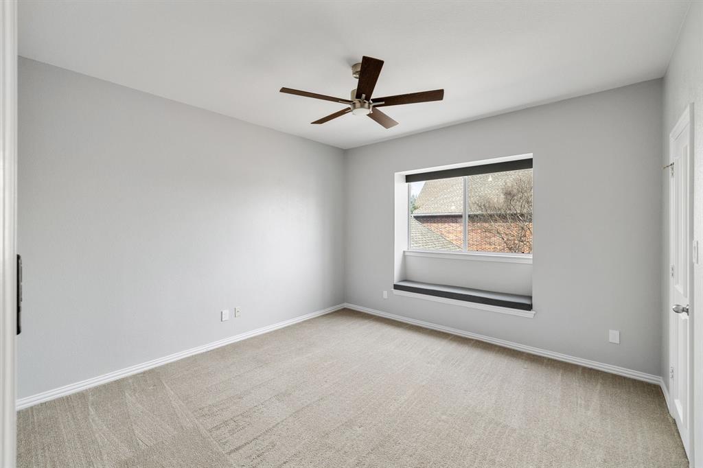 4512 Banyon Lane Dallas, TX 75287 - Photo 30 of 40 4512 Banyan Ln-Upstairs bedroom#1 with bay window by Fang Underhill.