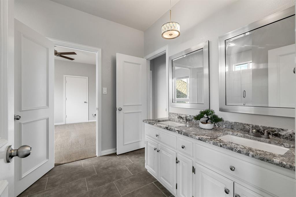 4512 Banyon Lane Dallas, TX 75287 - Photo 31 of 40 4512 Banyan Ln-Jack and Jill bath, with double vanity by Fang Underhill.