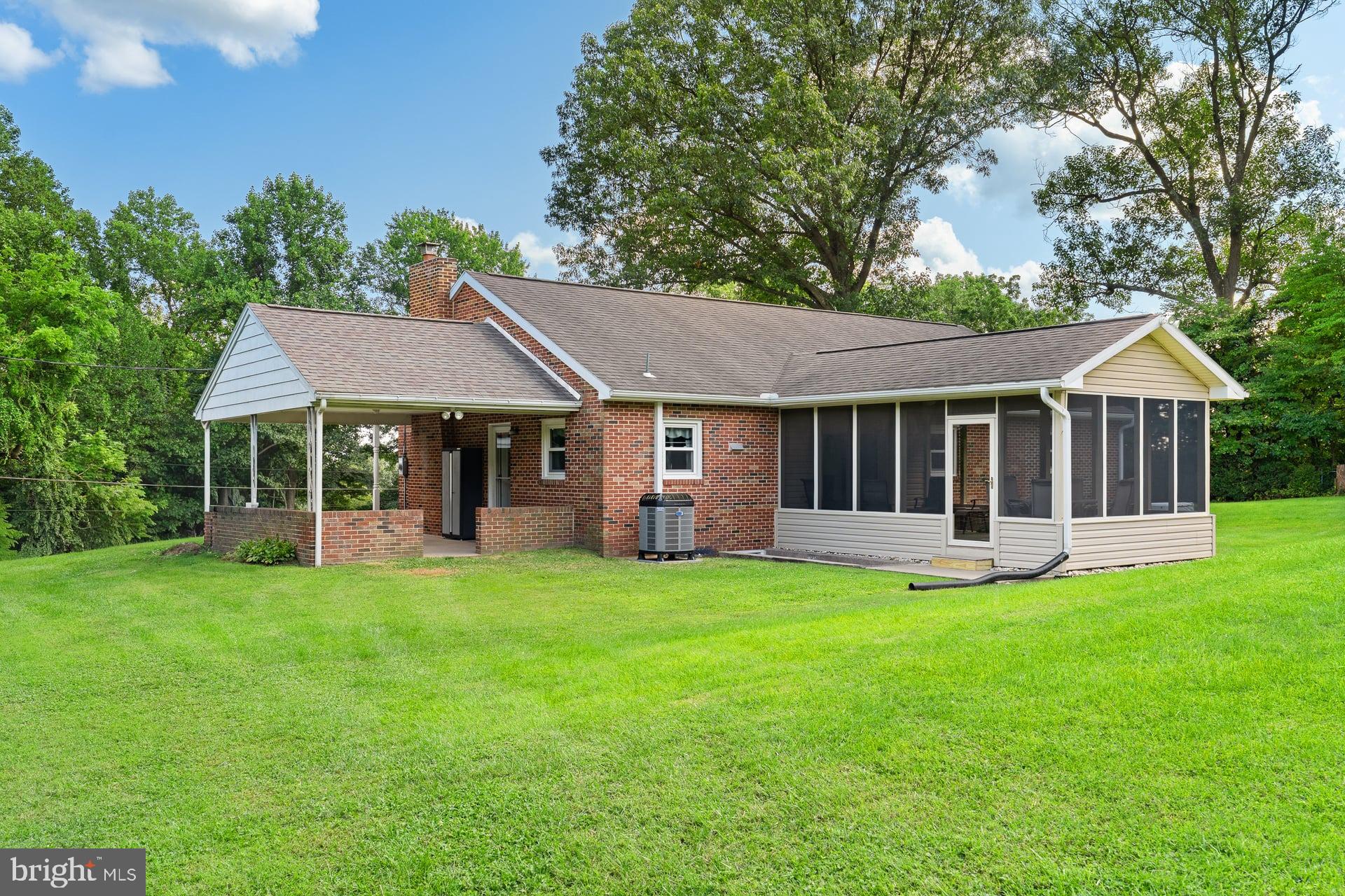 2012 Miller Road Hummelstown, PA 17036 - Photo 34 of 52 Back exterior with screened porch
