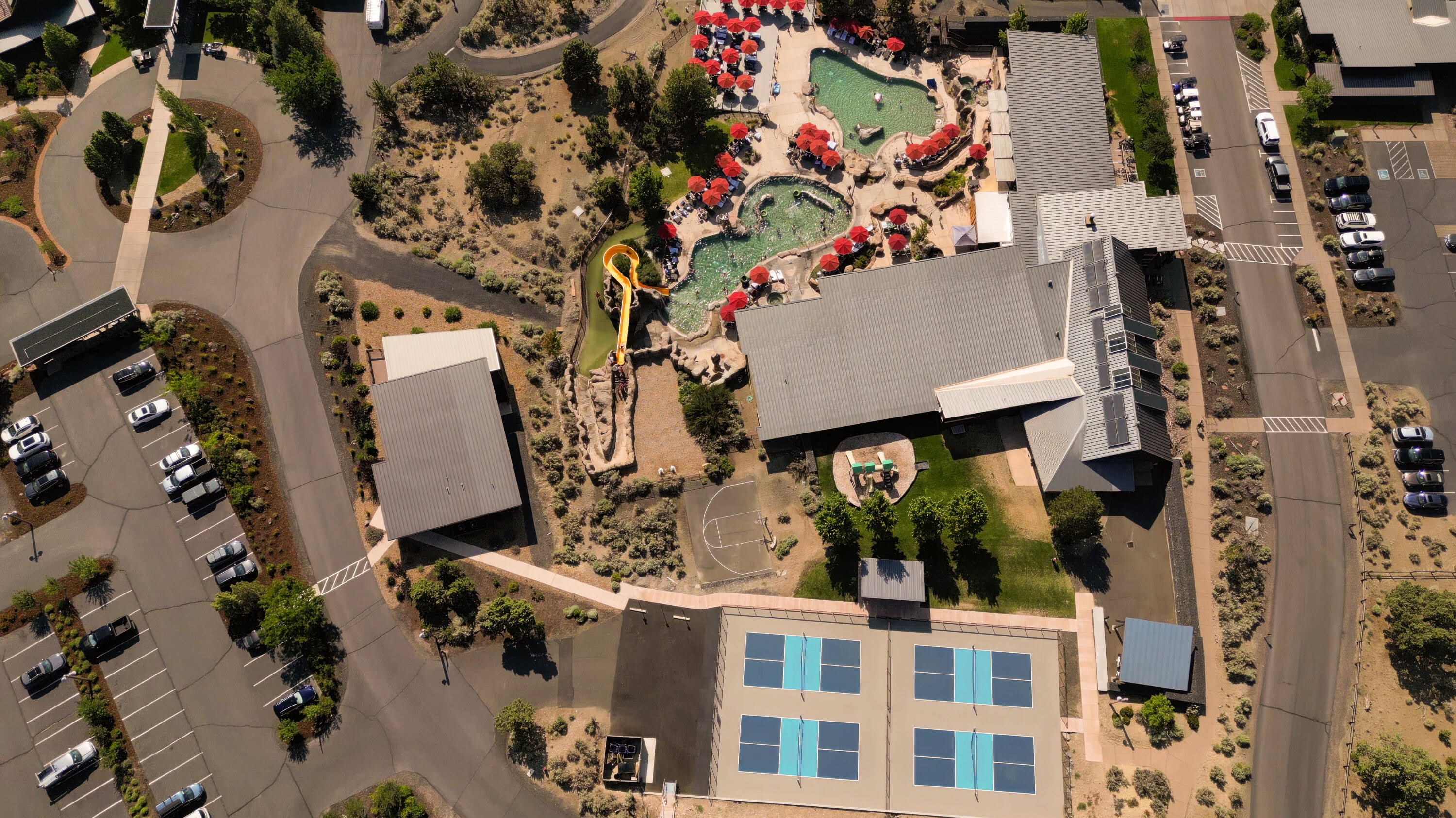 16539 South W Vaqueros Way, Unit 6 Powell Butte, OR 97753 - Photo 20 of 25 Pool and Pickleball Aerial