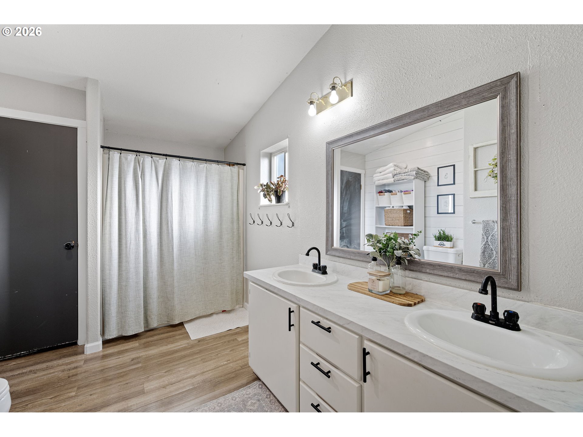 83149 Mickelson Road Creswell, OR 97426 - Photo 11 of 34 a bathroom with a sink and a mirror