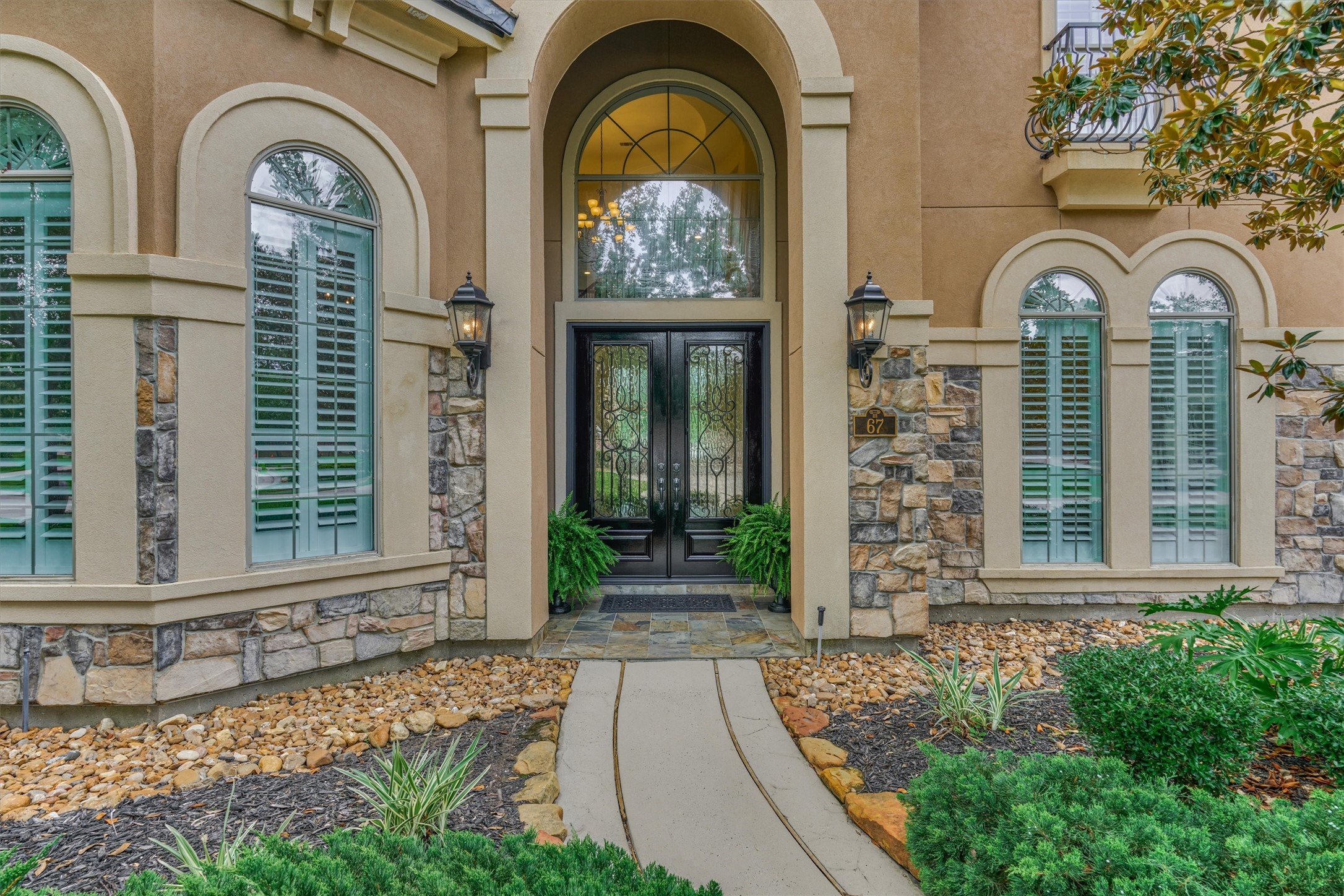 67 South Sage Sparrow Circle Spring, TX 77389 - Photo 2 of 49 a front view of a house with garden