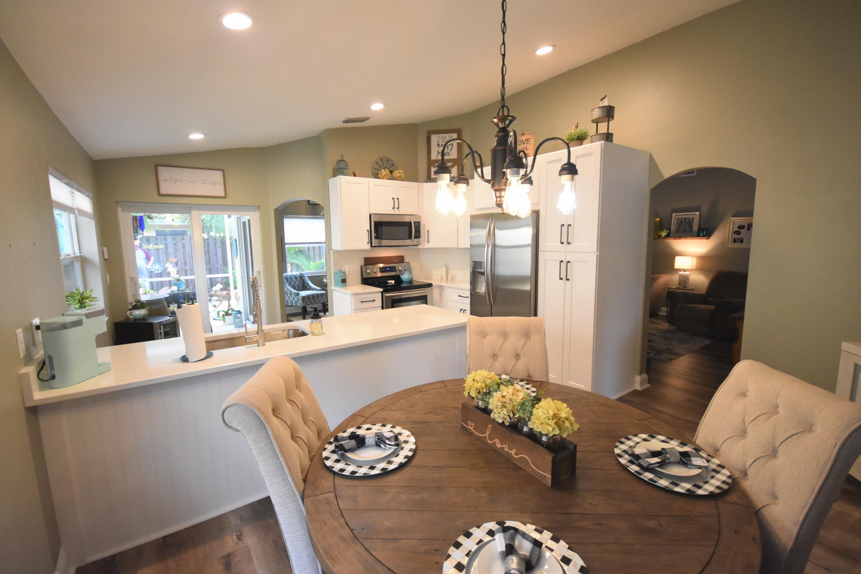 10709 Lake Jasmine Drive Boca Raton, FL 33498 - Photo 13 of 23 Kitchen Dining