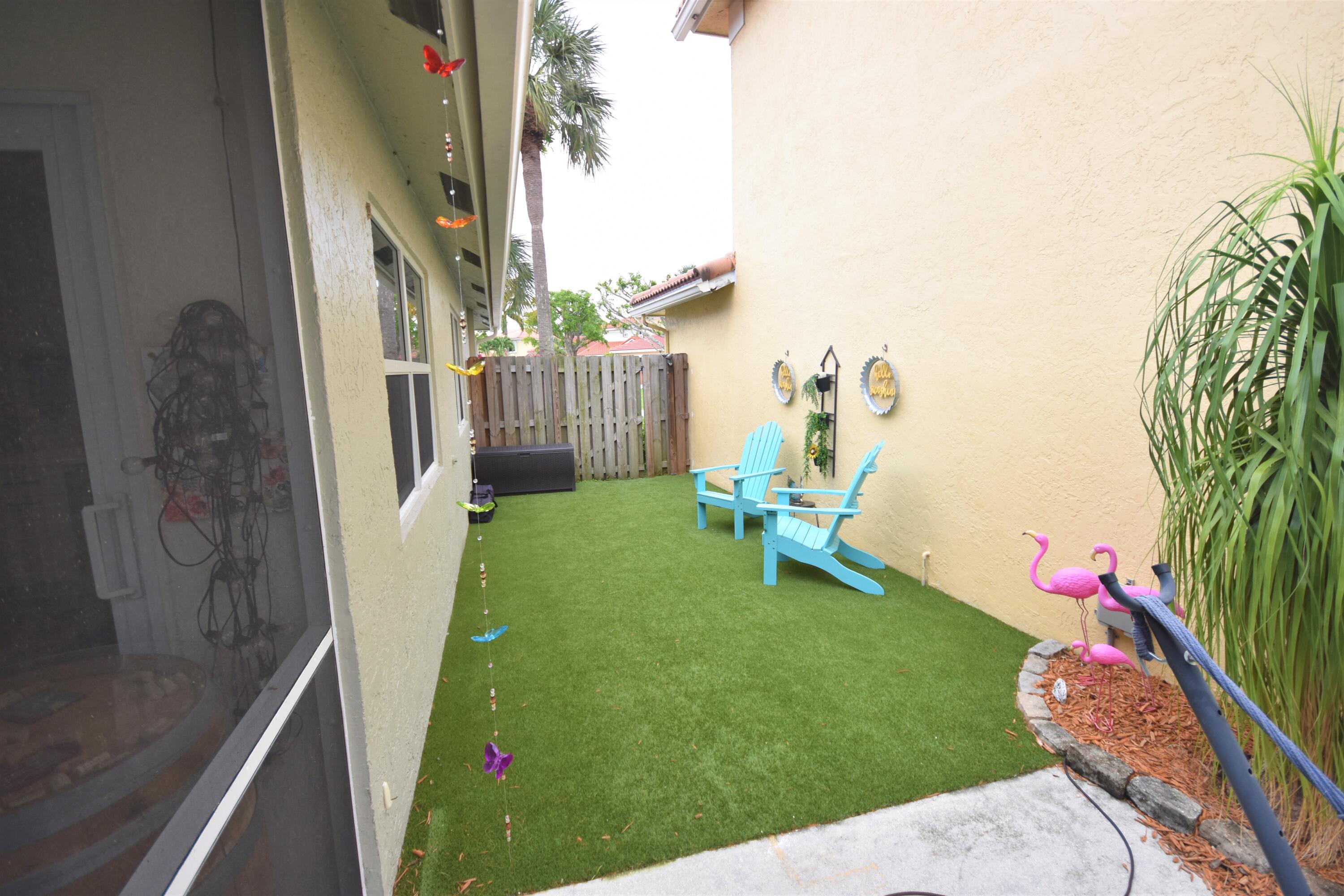 10709 Lake Jasmine Drive Boca Raton, FL 33498 - Photo 19 of 23 Side yard