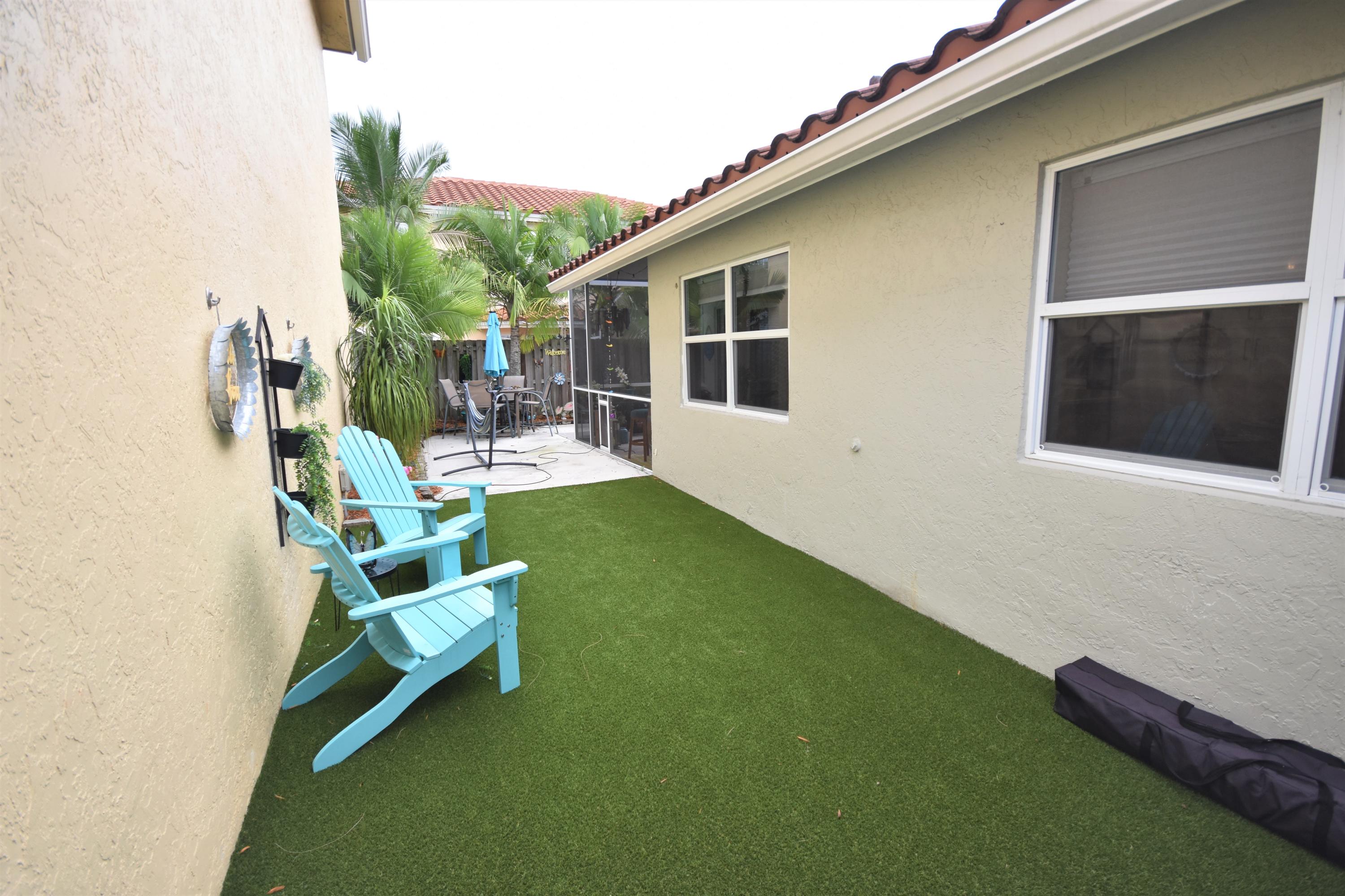 10709 Lake Jasmine Drive Boca Raton, FL 33498 - Photo 20 of 23 Side Yard