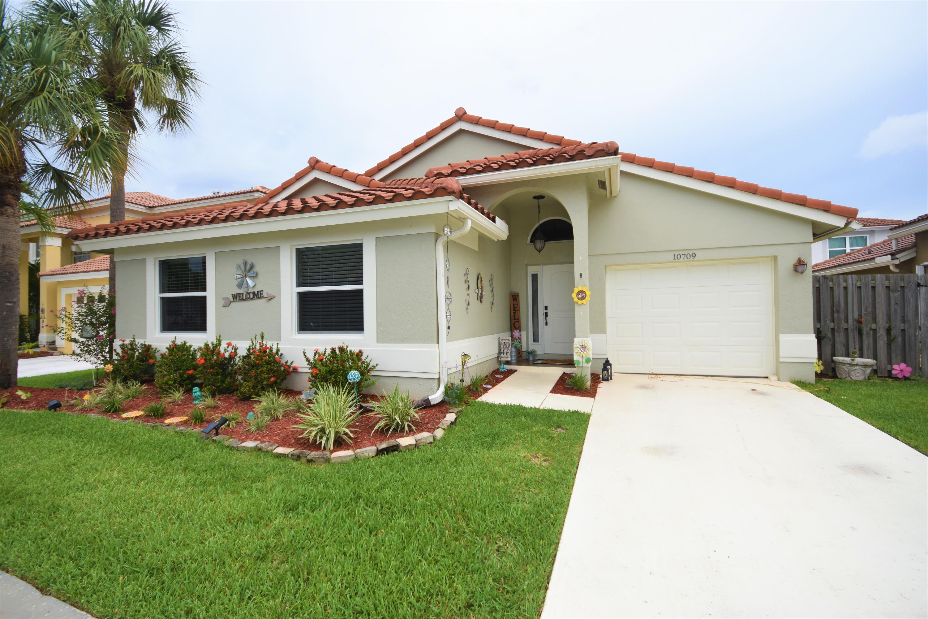 10709 Lake Jasmine Drive Boca Raton, FL 33498 - Photo 2 of 23 Front