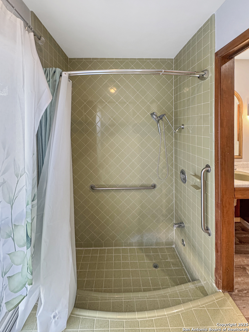 10806 Mount Tipton San Antonio, TX 78213 - Photo 21 of 22 a bathroom with a shower