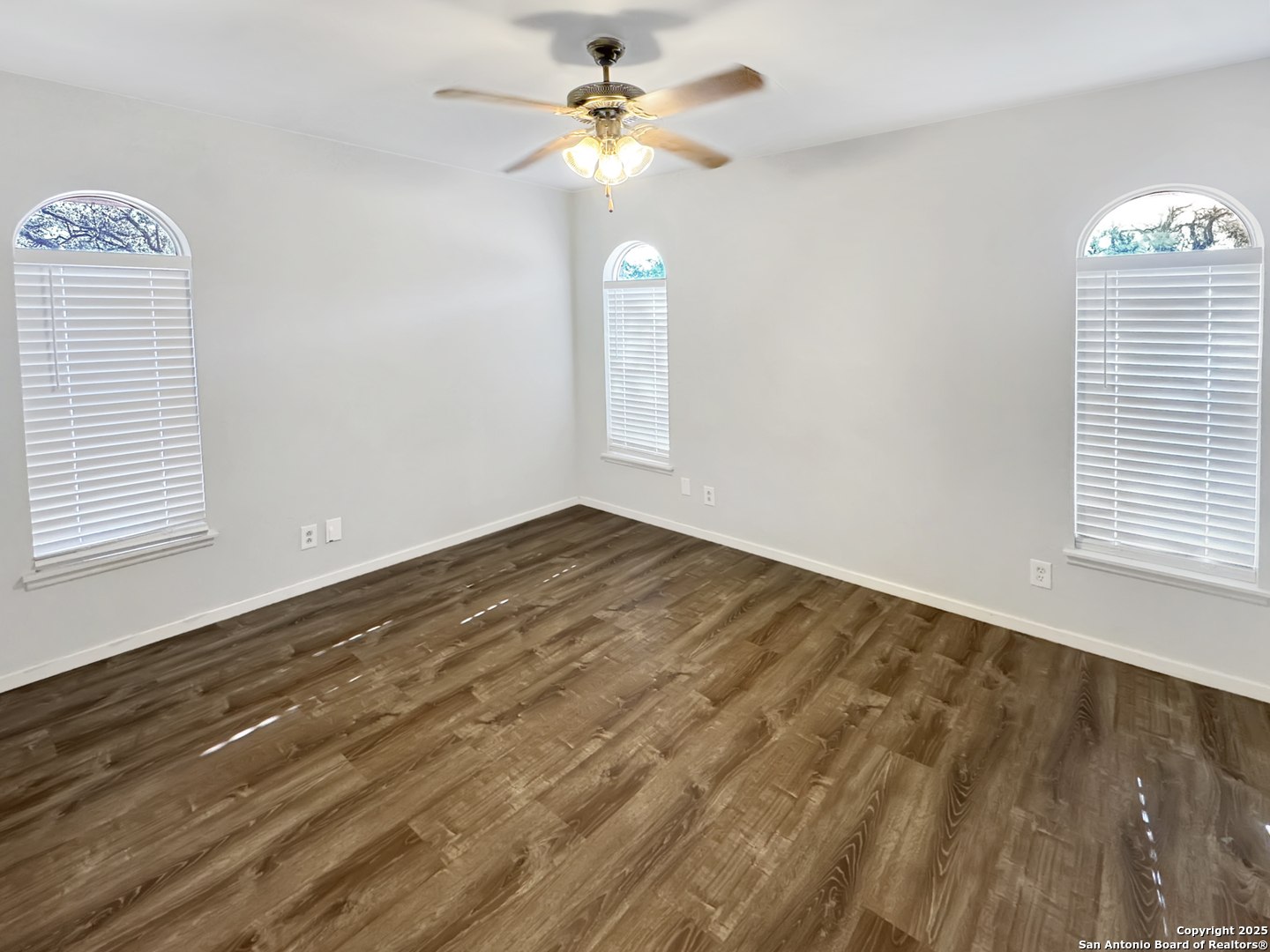10806 Mount Tipton San Antonio, TX 78213 - Photo 7 of 22 a view of an empty room with a window