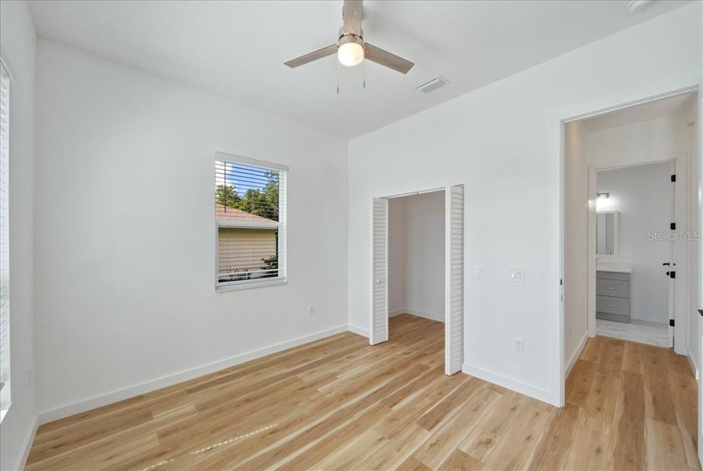 1215 Rio De Janeiro Avenue Punta Gorda, FL 33983 - Photo 51 of 65 a view of empty room with wooden floor