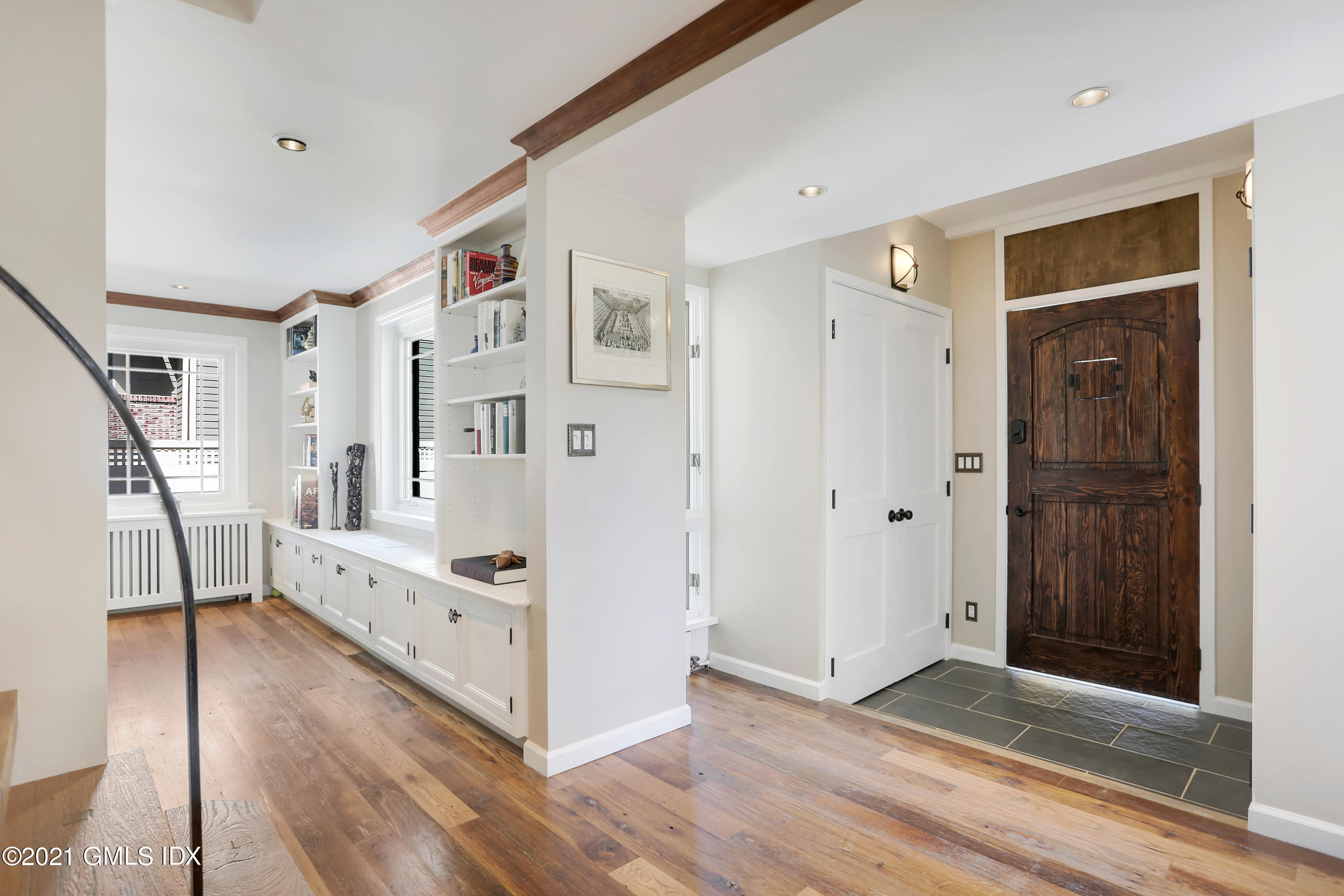 44 Summit Road Riverside, CT 06878 - Photo 2 of 28 a view of an entryway with wooden floor and windows