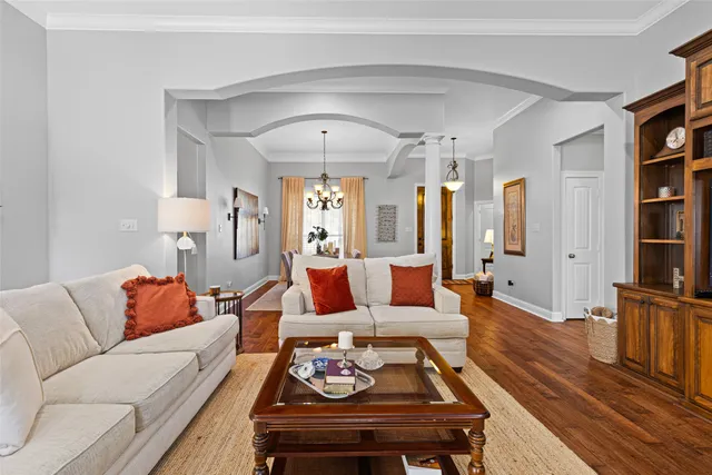 a living room with furniture and a rug