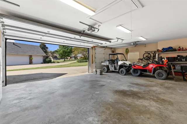 a view of parking space with parked cars