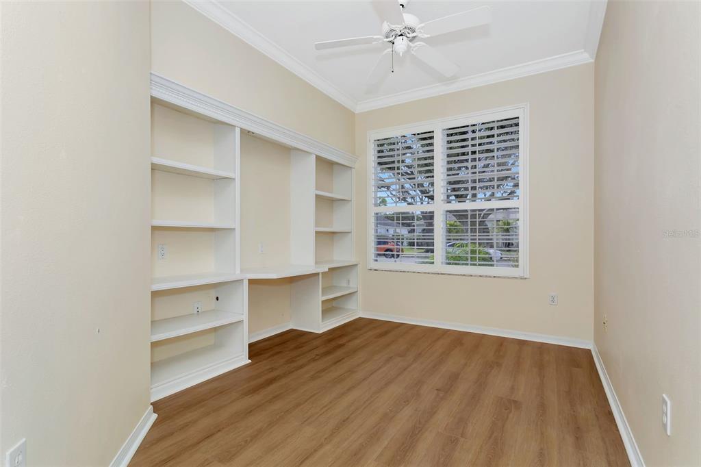 11209 Pine Lilly Place Lakewood Ranch, FL 34202 - Photo 20 of 26 a view of a room with rack on the wall and a window