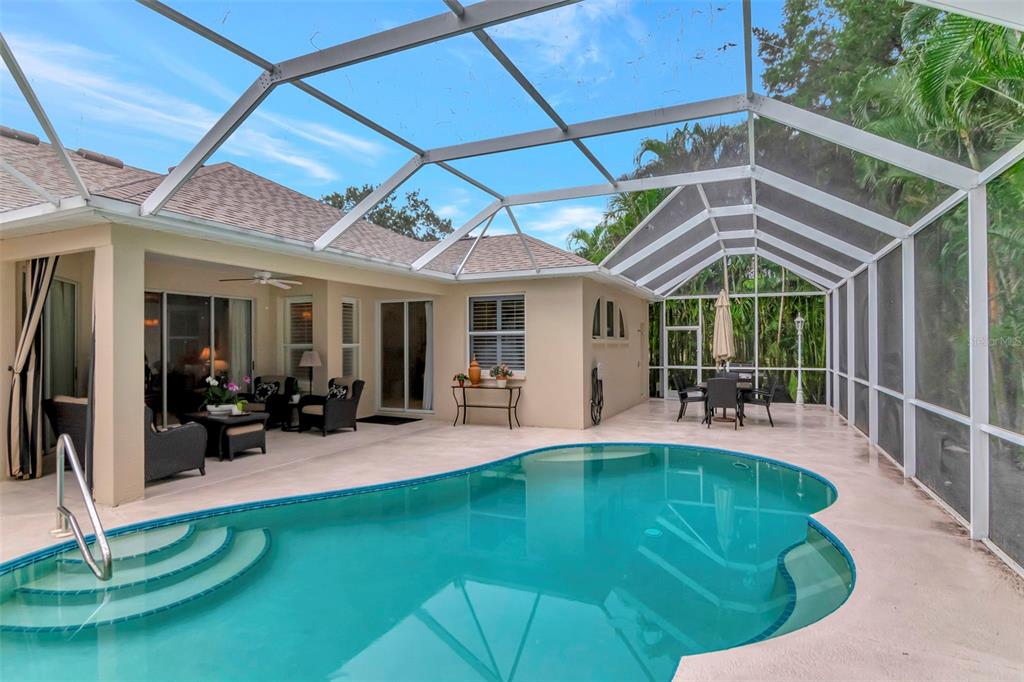 11209 Pine Lilly Place Lakewood Ranch, FL 34202 - Photo 26 of 26 a view of a lounge chairs in a patio