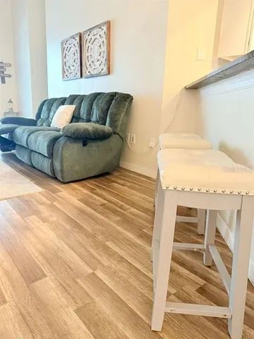 a bedroom with a bed and chair