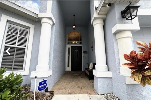 a front view of a house with outdoor space