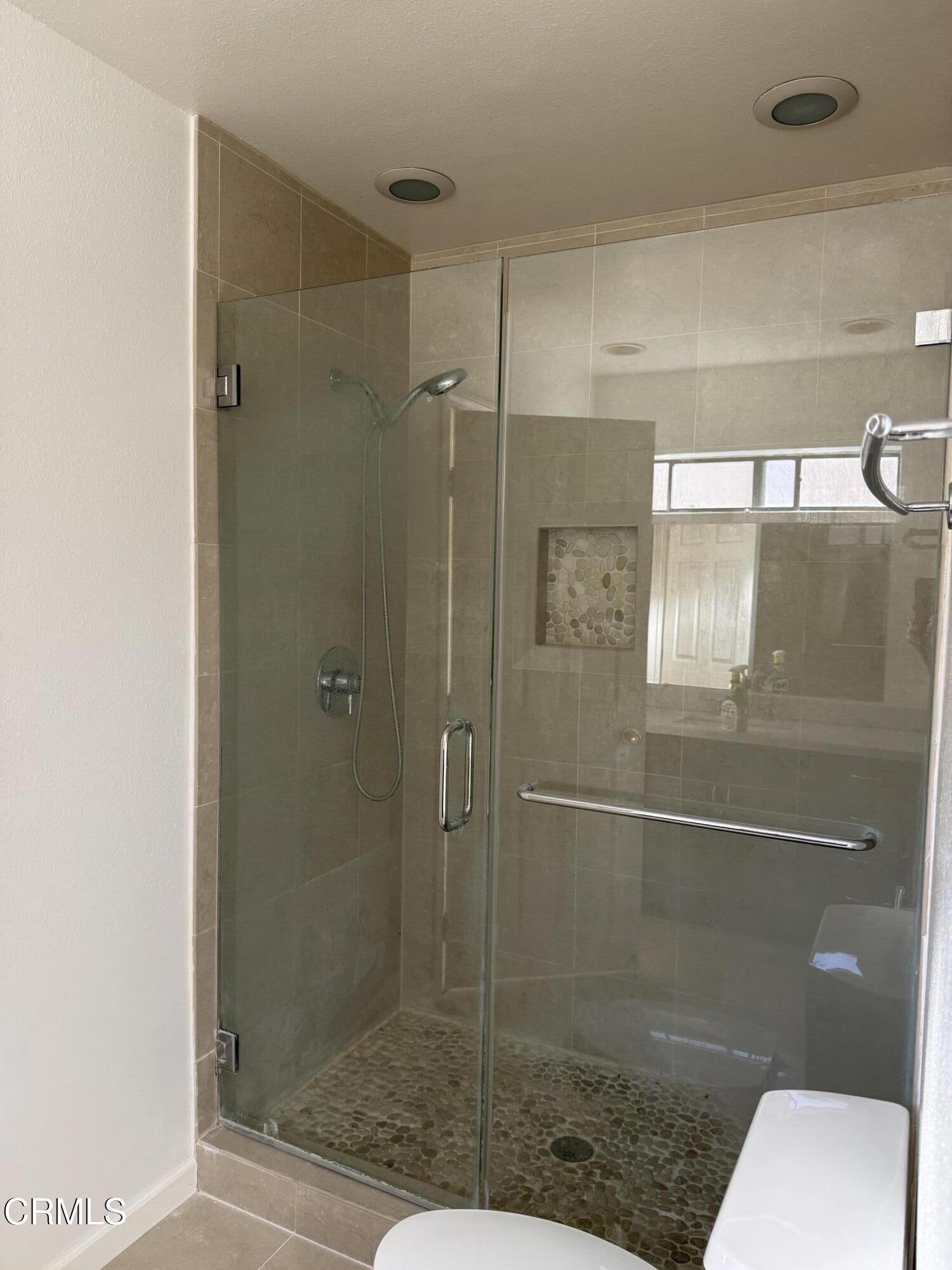 108 North Chapel Avenue, Unit 5 Alhambra, CA 91801 - Photo 16 of 30 a bathroom with a shower a toilet and sink