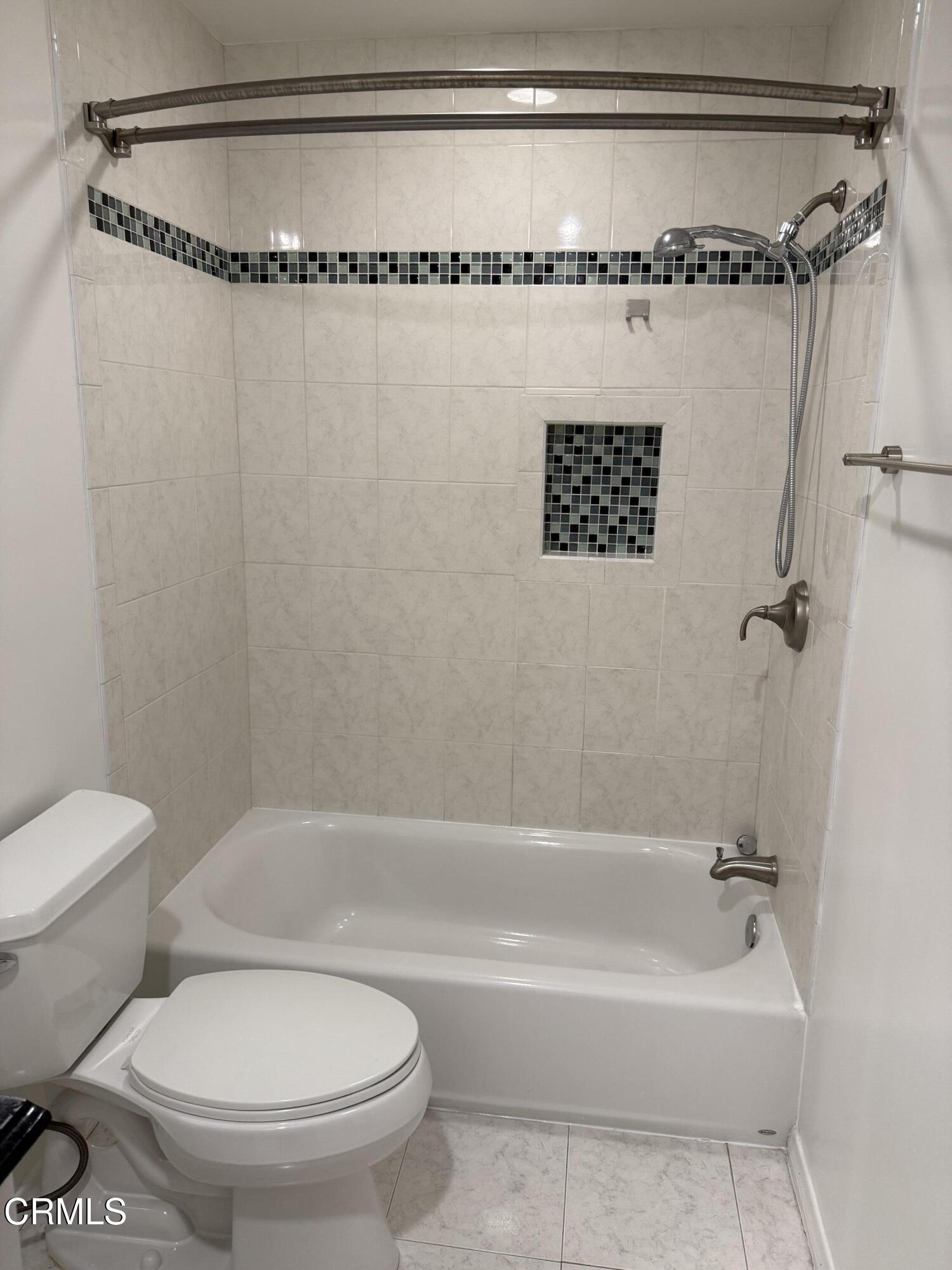 108 North Chapel Avenue, Unit 5 Alhambra, CA 91801 - Photo 23 of 30 a bathroom with a shower a bathtub and a toilet