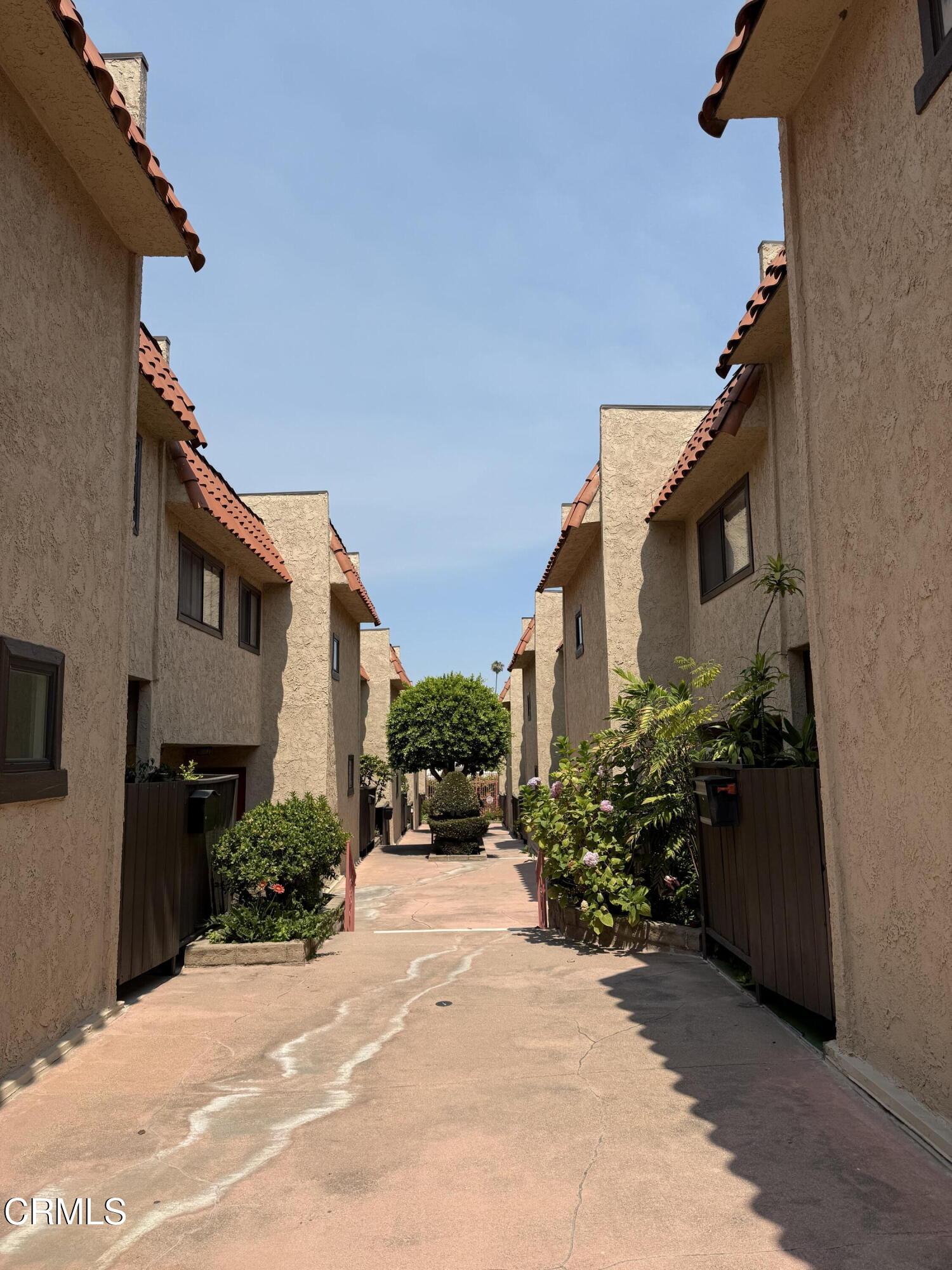 108 North Chapel Avenue, Unit 5 Alhambra, CA 91801 - Photo 29 of 30 a view of a house with a yard