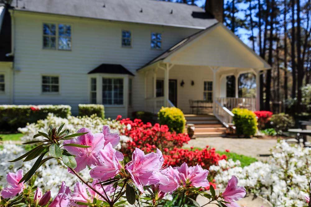 11905 Old Creedmoor Road Raleigh, NC 27613 - Photo 23 of 24 a front view of a house