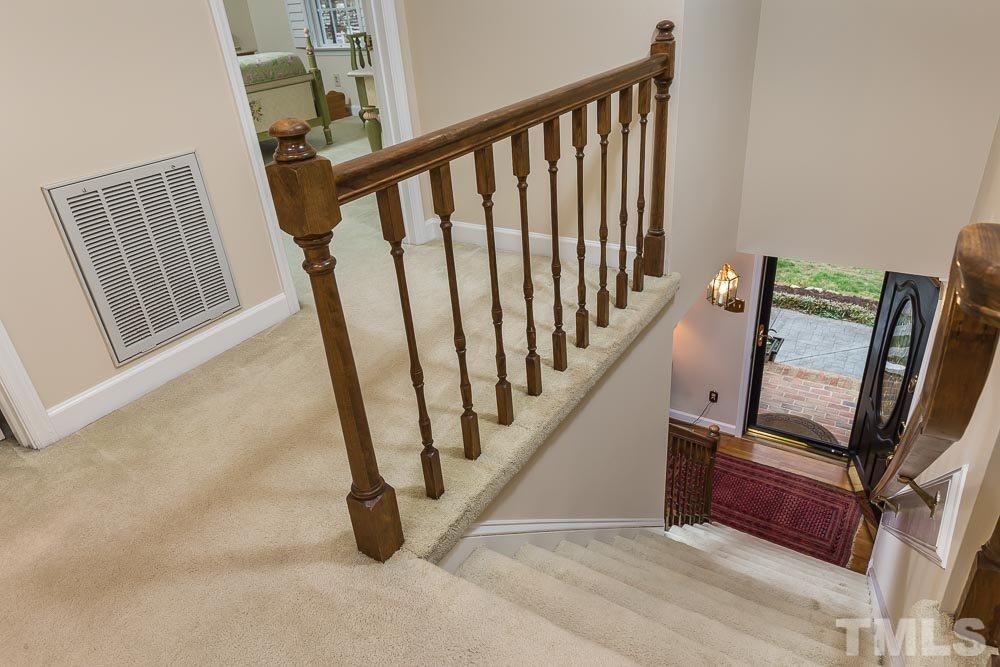 11905 Old Creedmoor Road Raleigh, NC 27613 - Photo 4 of 24 a view of an entryway with staircase